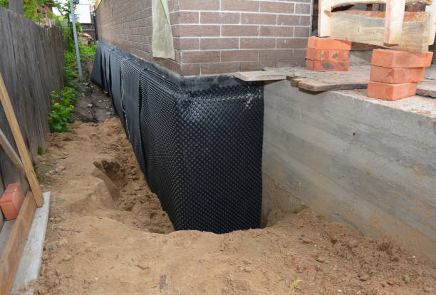SJ Waterproofing Pros technician performing targeted Waterproofing assessment in New Hope, MN